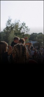 Raised hands at a community gathering